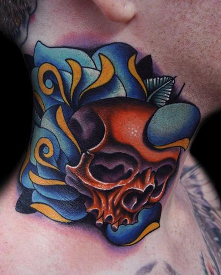 Traditional Skull And Rose Tattoo